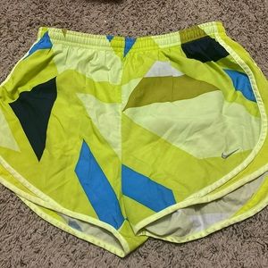 Green and blue nike athletic shorts